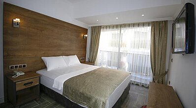 Aurasia Sea Side Hotel Oda