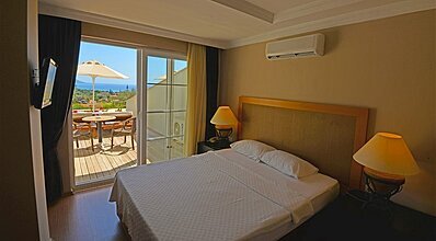 Manaspark Deluxe Hotel Oda